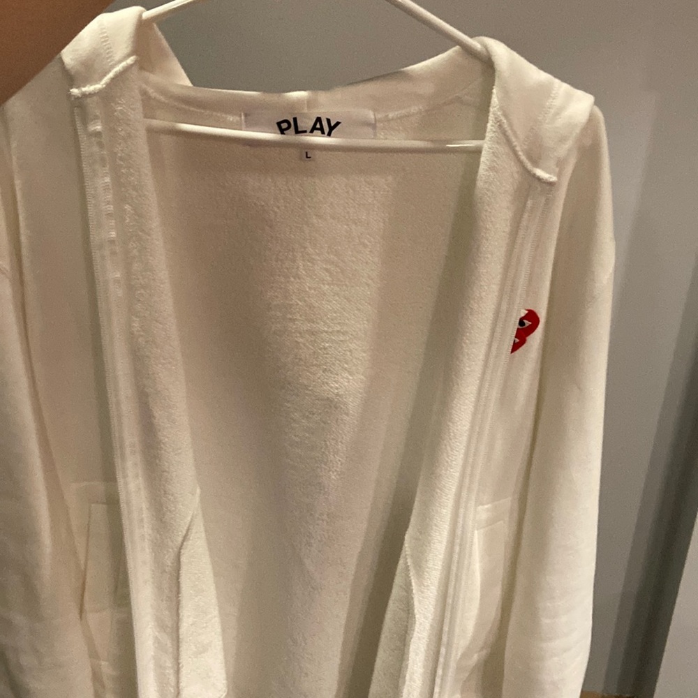 Brand New Comme Des Garcons White Zip up Hoodie with no tags. Wrong size